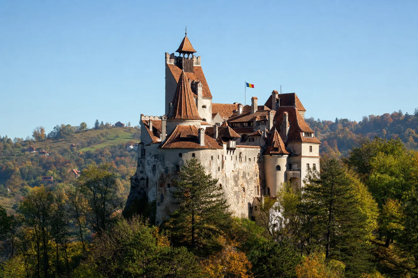 Romania – famous landmark with the national flag